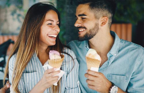 couple enjoying an ice cream cone